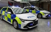 Two police cars parked side by side